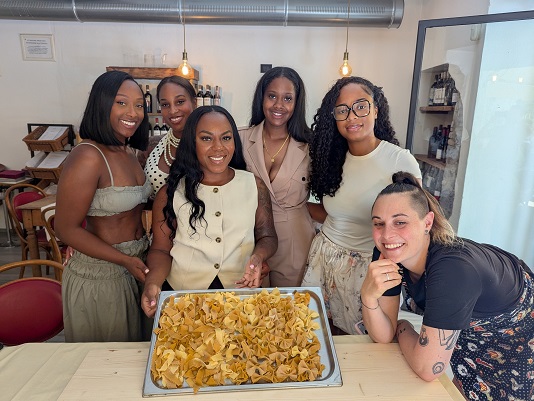 Girls with the pasta made during the group class
