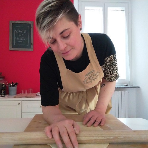 Chef Beatrice wearing a Bake Off Italia apron
